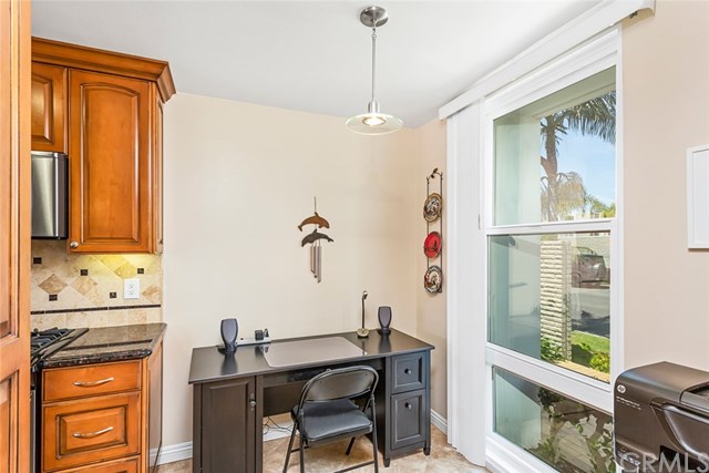 4002 Aladdin Drive Huntington Beach, CA 92649 - Photo 18 of 55 The current owners use this space as a "home office," but it was intended for a kitchen table and chairs. Notice the new, vinyl, energy-efficient window on the right!