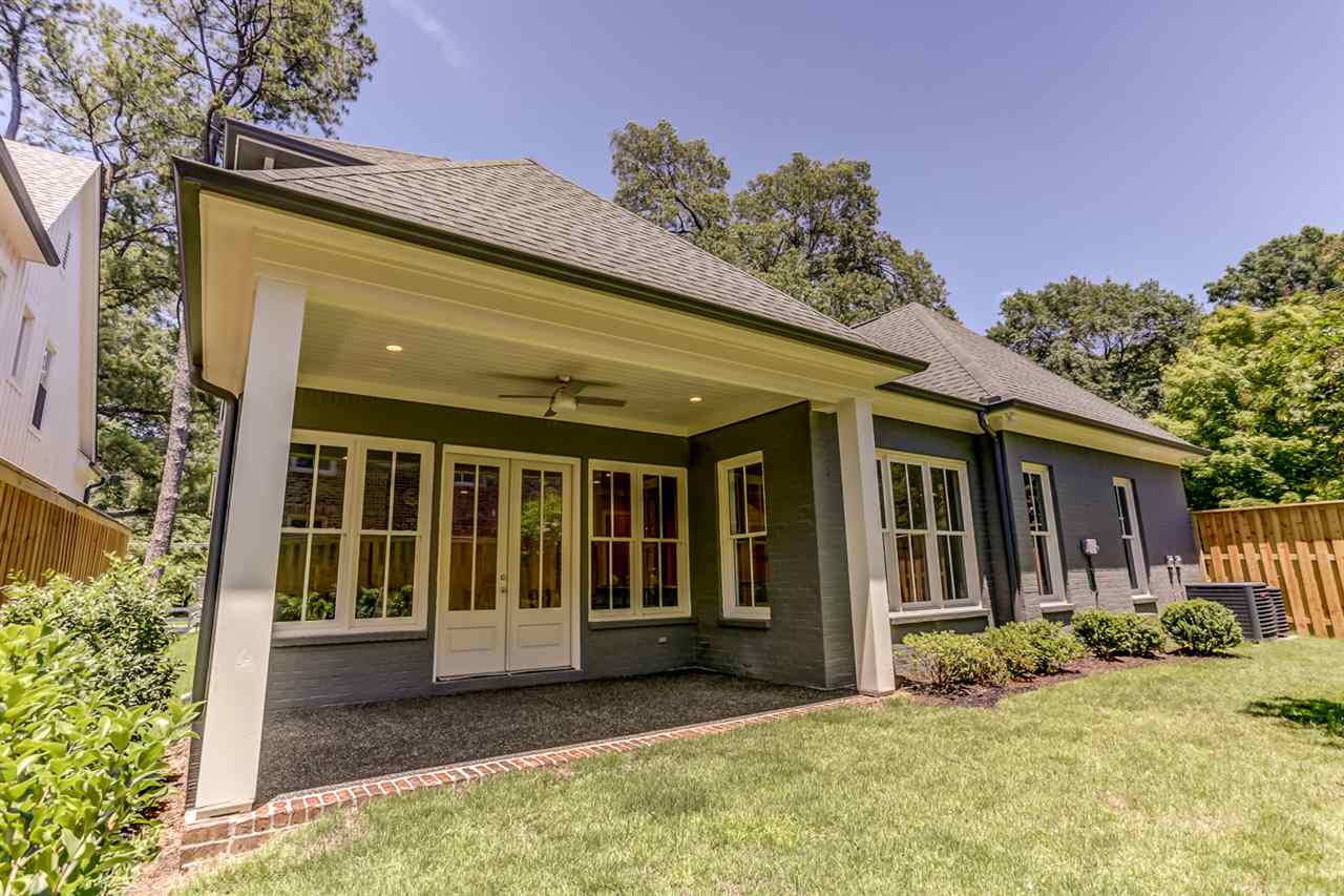 4635 Princeton Road Memphis, TN 38117 - Photo 25 of 25 Relax in this lovely covered porch overlooking a professionally landscaped backyard. Perfect space for relaxing, playing, or grilling! Limestone porch w/brick accent trim, Hunter fan w/remote control, and lovely painted ceilings!
