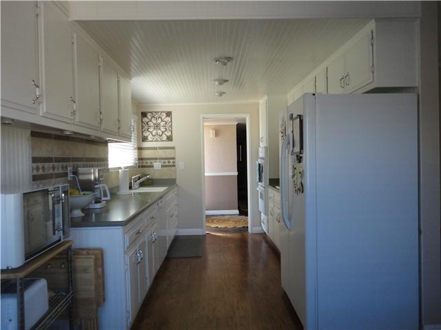 844 Brotherton Road Escondido, CA 92025 - Photo 4 of 20 open kitchen to hallway, kitchen nook and family room