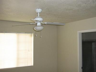 616 R Street Bakersfield, CA 93304 - Photo 7 of 14 Bedroom #2 with paddle fan and nice natural lighting.