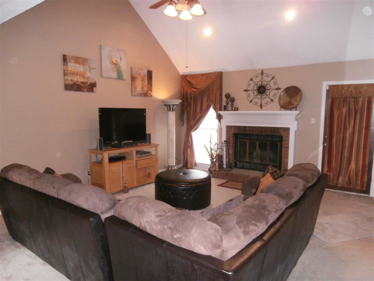 8474 Dulwich Road Memphis, TN 38016 - Photo 9 of 24 Another view of the Great Room with comfy fireplace for those chilly evenings! Very open to the rest of the home!