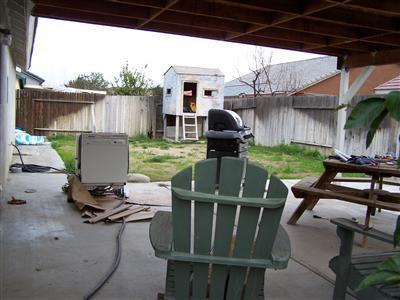 4515 Oregano Road Bakersfield, CA 93313 - Photo 8 of 8 Backyard has covered patio.