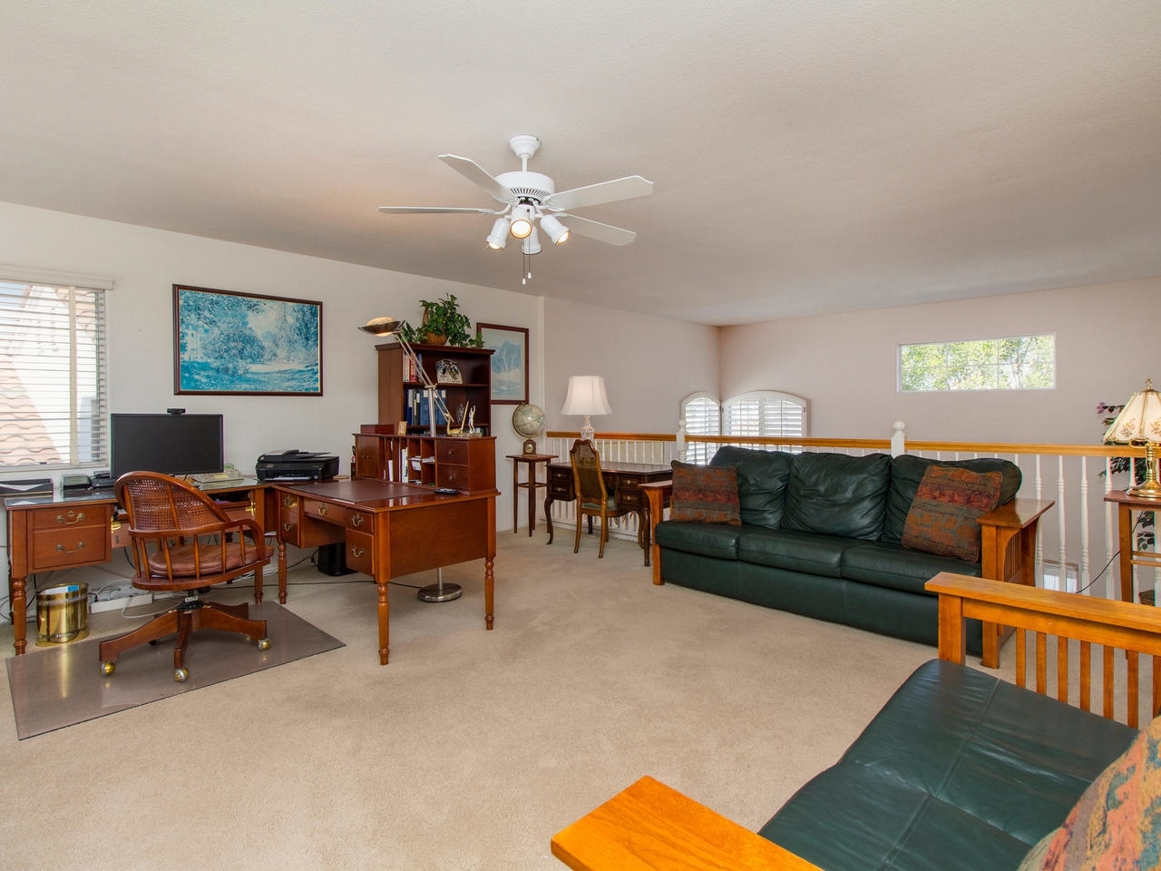 6047 Piros Way Oceanside, CA 92056 - Photo 16 of 25 The large open Loft has plenty of space for an office as well as an additional sitting area with views of the formal Living Room adding to the light and bright feel of the home.