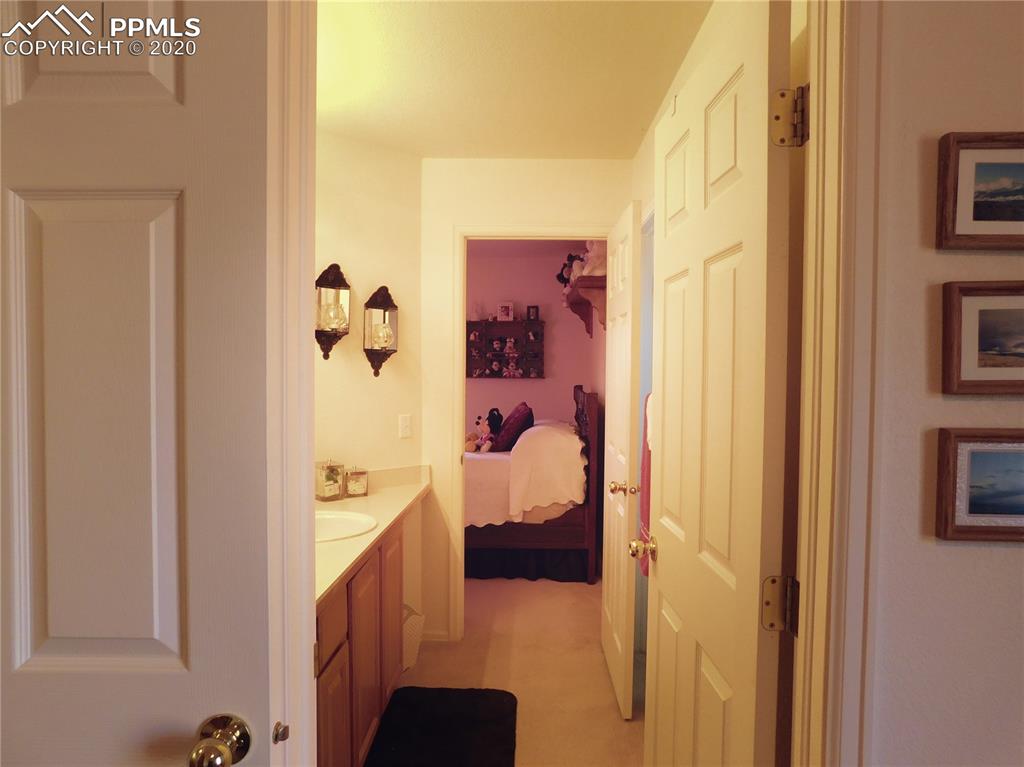 6565 Quarter Circle Road Colorado Springs, CO 80922 - Photo 16 of 21 Jack n Jill bathroom