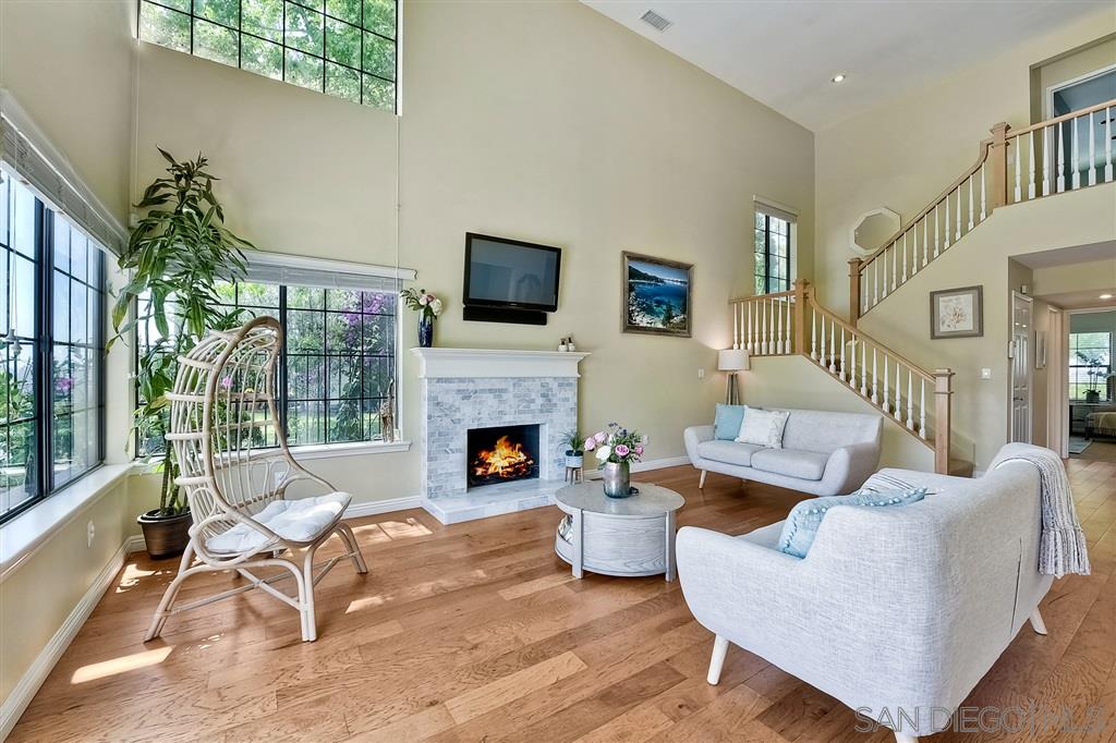 3756 Brand Crest Encinitas, CA 92024 - Photo 4 of 25 Living room can be used as large family room w fireplace.