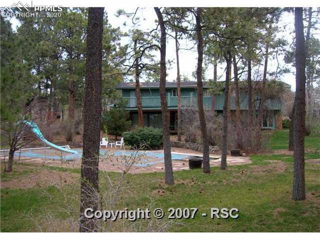 11350 Holmes Road Colorado Springs, CO 80908 - Photo 2 of 14 Back of house and pool