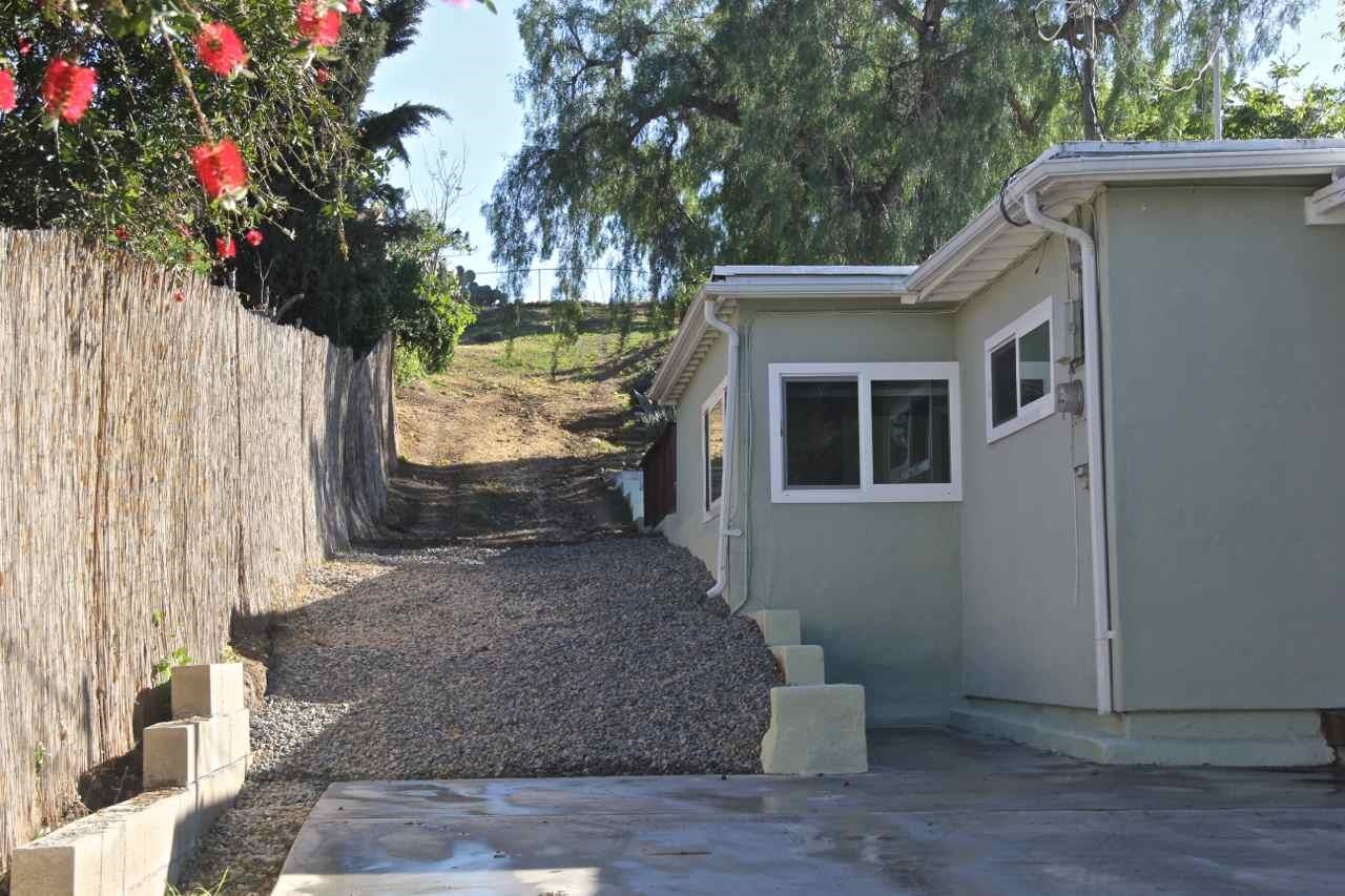9115 Rosedale Drive Spring Valley, CA 91977 - Photo 2 of 24 Driveway into back yard.