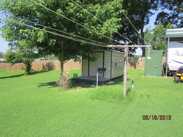 723 Simmons Road Drummonds, TN 38023 - Photo 18 of 19 This shed has a storm shelter.