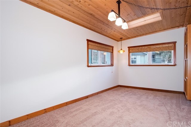 34096 El Contento Dana Point, CA 92629 - Photo 18 of 43 Separate Dining room adjacent to the living room with tongue and groove ceiling and skylights!