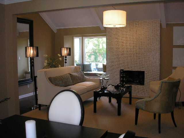 5677 North Angela Road Memphis, TN 38120 - Photo 3 of 10 This traditional great room has been reinvented all the way to the vaulted ceiling. Hardwood floors, bay window with a beautiful view of the pool. Flows into large dinning room.