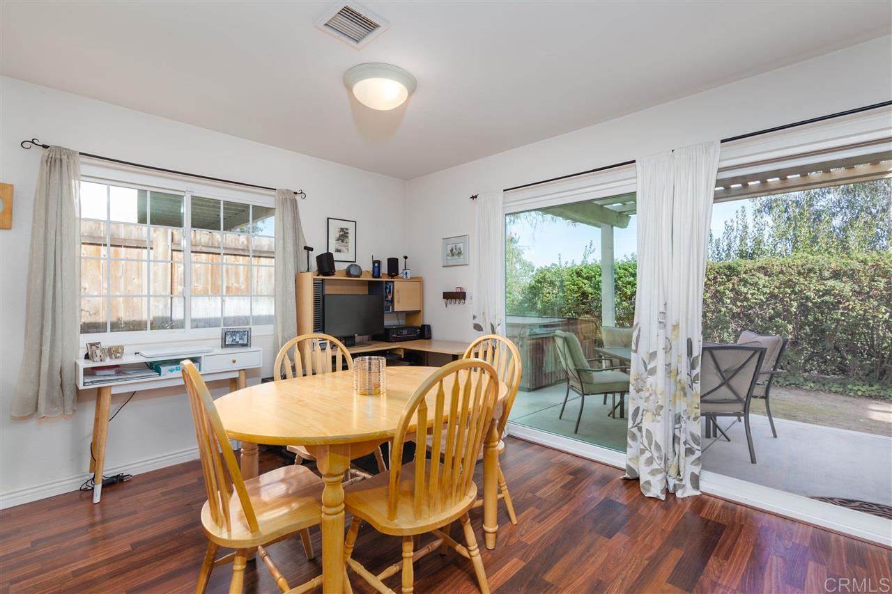 3115 Villa Colina Spring Valley, CA 91978 - Photo 6 of 13 Good size dining area open to living room.