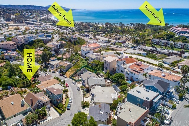 34096 El Contento Dana Point, CA 92629 - Photo 2 of 43 Truly a rare and amazing opportunity to own a quintessential Lantern Village beach bungalow situated atop one of the largest LOTS in the area with OCEAN and Whitewater vistas! This home is perfectly located within walking distance to Doheny beach, Dana Point harbor, parks, downtown restaurants, bike trails, shops and much more!