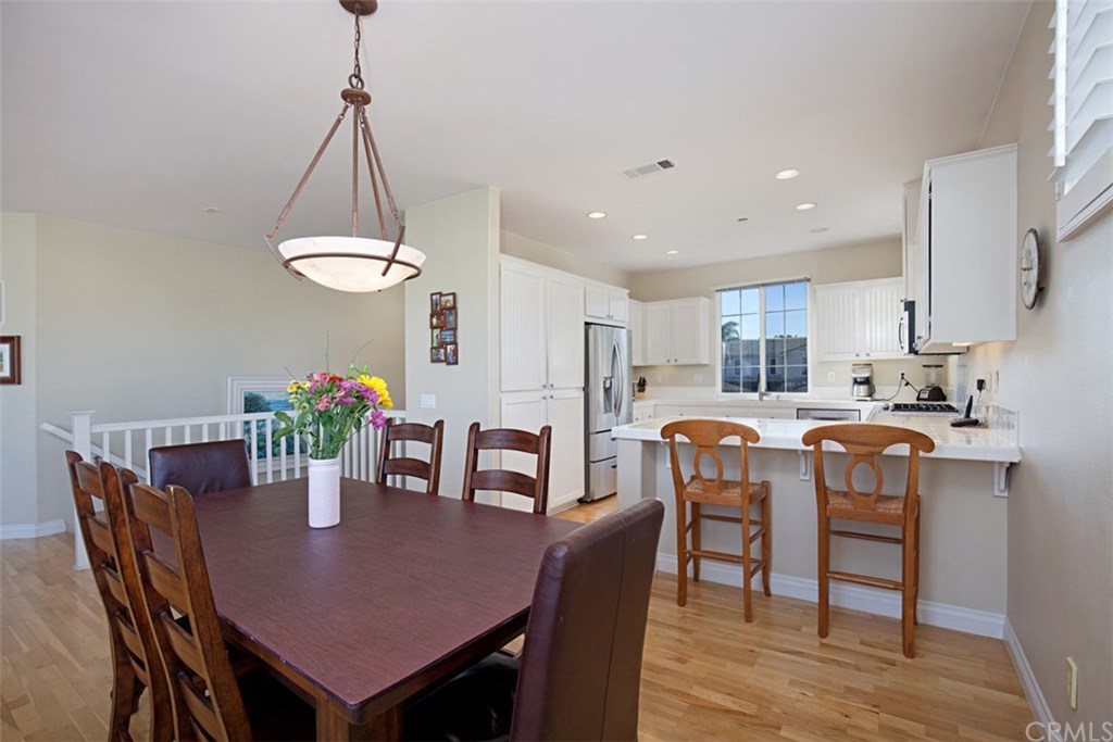 605 Corte Calmo San Clemente, CA 92673 - Photo 8 of 27 Dining area and kitchen.