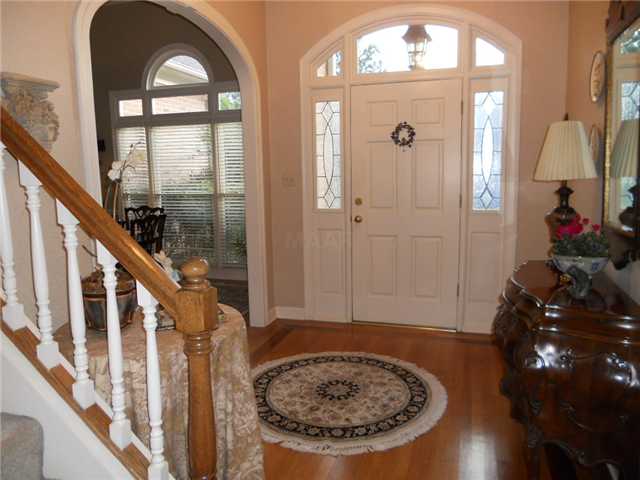 1738 Gosnold Bluff Road Collierville, TN 38017 - Photo 12 of 12 This spacious floor plan features smooth ceilings, 2" blinds and handsome hardwood floors continuing throughout the gracious living areas.
