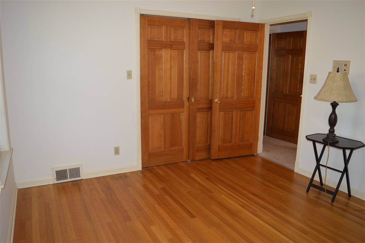 6017 Quince Road Memphis, TN 38119 - Photo 25 of 25 This bedroom has a great double closet and these wood doors are fabulous!