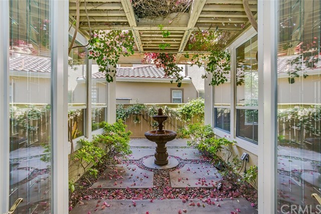 46 Rolling Ridge Rancho Santa Margarita, CA 92688 - Photo 10 of 26 Enjoy the shaded courtyard and fountain, between the living and dining rooms.
