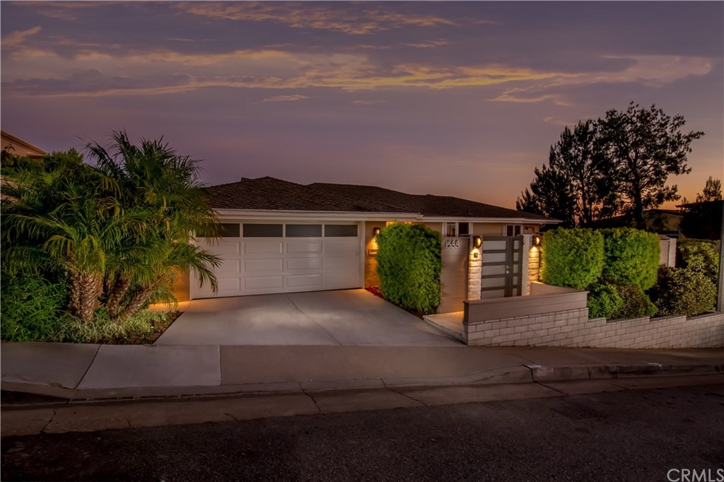 1588 Skyline Drive Laguna Beach, CA 92651 - Photo 3 of 18 Professionally landscaped with custom privacy gate and exterior lighting.