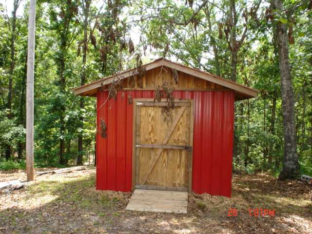 2115 Gladden Road Counce, TN 38326 - Photo 8 of 8 Also has storm sheltor behind this Storage blge.