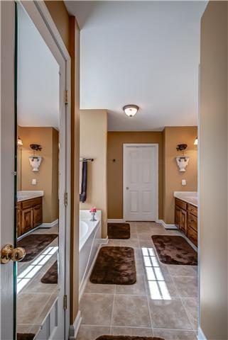 1681 Center Star Road Columbia, TN 38401 - Photo 14 of 30 Master bathroom with large walk in closet, garden tub and shower.