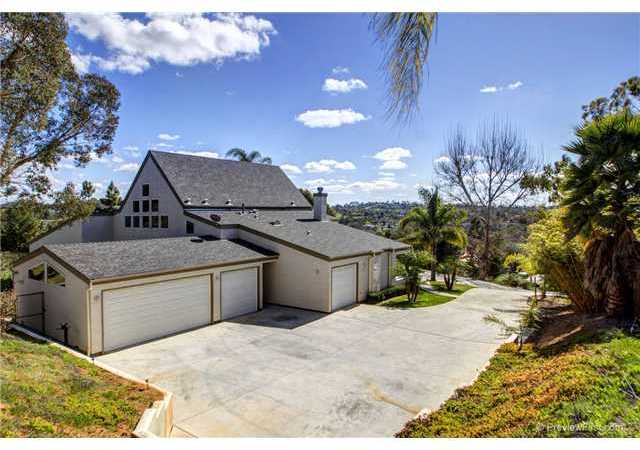 3132 Caminito Ricardo Encinitas, CA 92024 - Photo 6 of 23 Four car garage. Epoxy flooring , built in cabinetry, oversized four car garage.