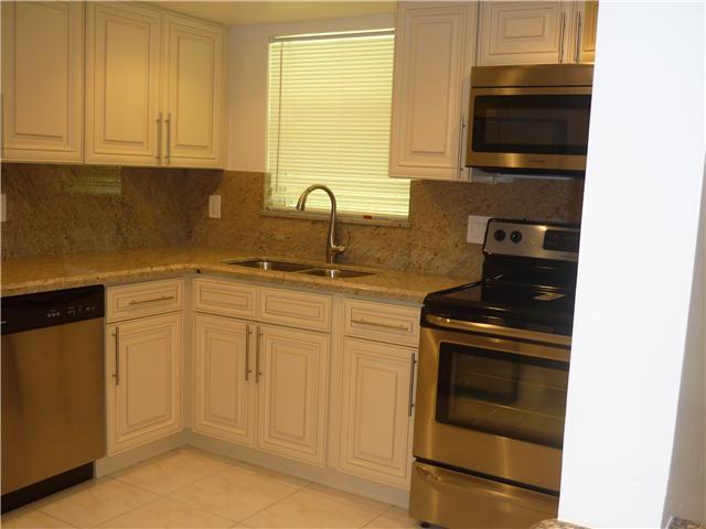 3100 Riverside Drive, Unit 103 Coral Springs, FL 33065 - Photo 1 of 25