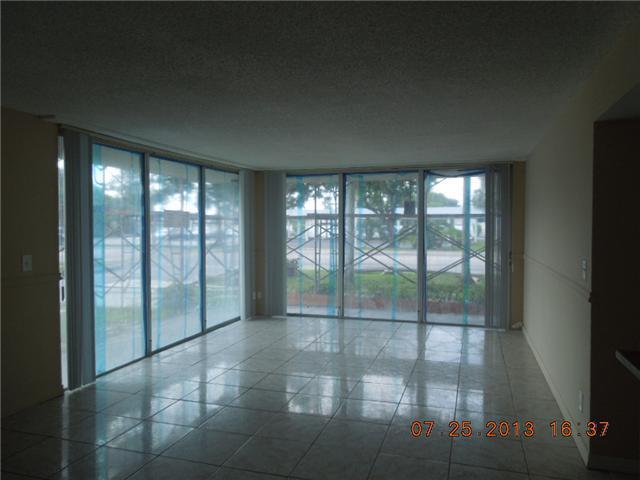 700 Northwest 214th Street, Unit 101 Miami, FL 33169 - Photo 6 of 12