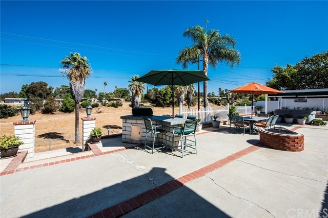 2001 Cypress Point Drive Corona, CA 92882 - Photo 41 of 62 Rear yard includes built in barbecue, fire-pit, and above ground spa with patio cover
