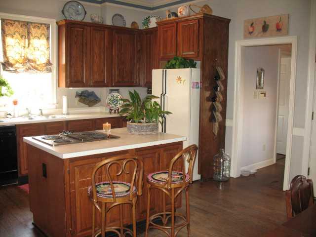 411 Colonial Road Memphis, TN 38117 - Photo 7 of 10 Kitchen leads to Laundry Room, Garage, and covered patio. Very open!