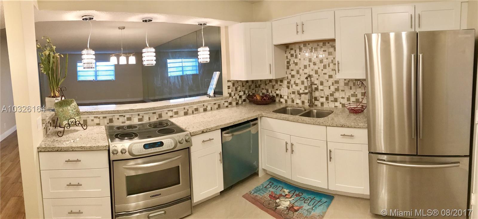22615 Southwest 66th Avenue, Unit 404 Boca Raton, FL 33428 - Photo 1 of 11