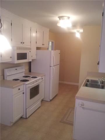 1046 Gen George Patton Road, Unit 1046 Nashville, TN 37221 - Photo 23 of 30 This is a galley style kitchen & everything is within easy reach.