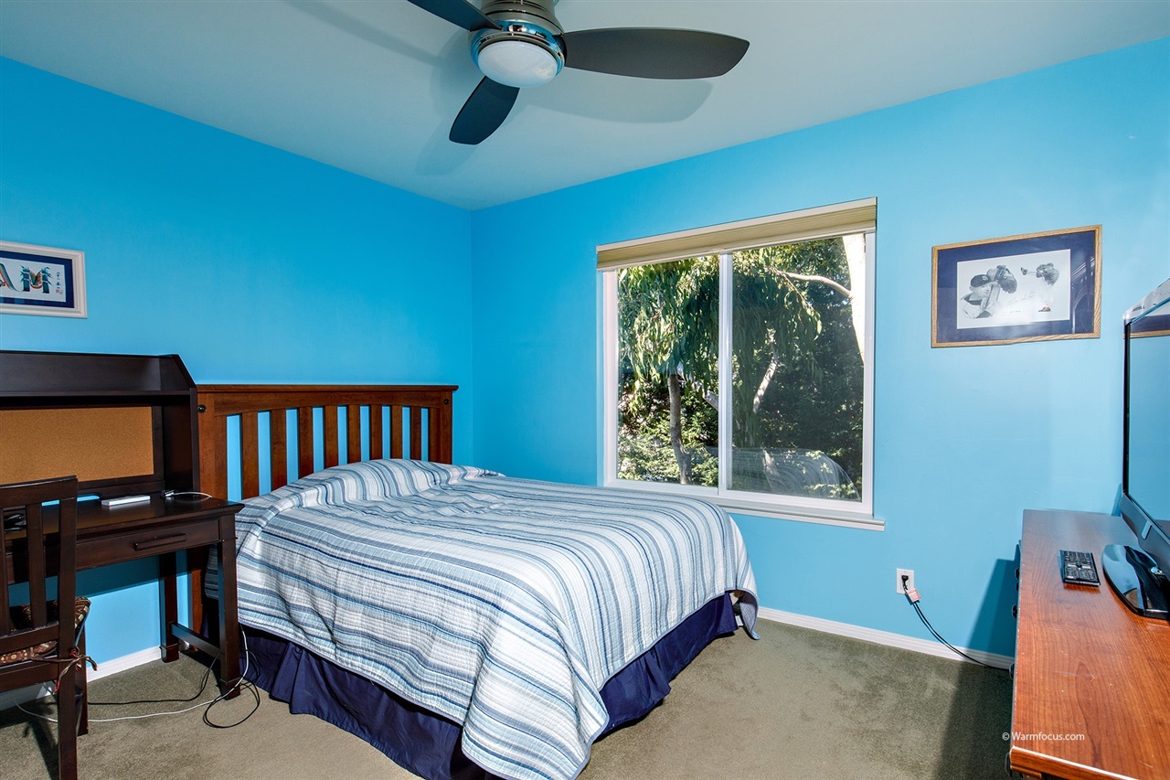 449 Ocean View Avenue Encinitas, CA 92024 - Photo 17 of 23 Bedrooms with sliding door closets and ceiling fans