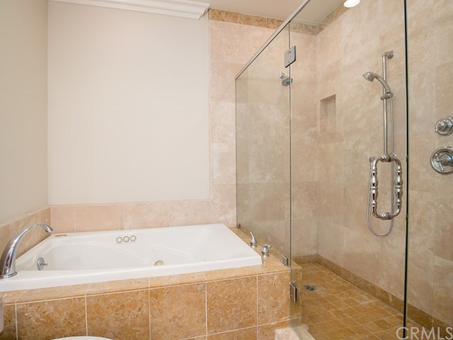 2302 Grant Avenue, Unit 2 Redondo Beach, CA 90278 - Photo 23 of 29 Grand ensuite featuring double sinks, decorative tile back splash, separate tub and extra-large frameless shower