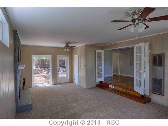 830 Sunset Road Colorado Springs, CO 80909 - Photo 4 of 18 French Doors to Family Room