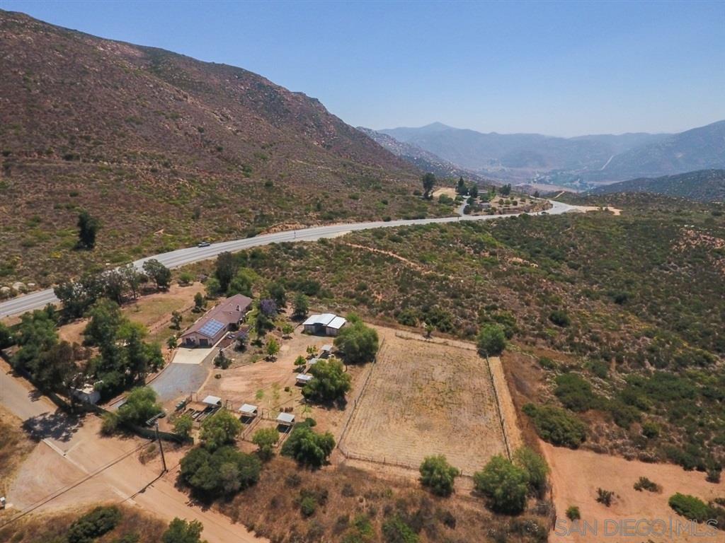 18921 Highway 94 Dulzura, CA 91917 - Photo 23 of 25 The entire property on the south end of Hwy 94 is fully fenced with a 6ft chain link fence