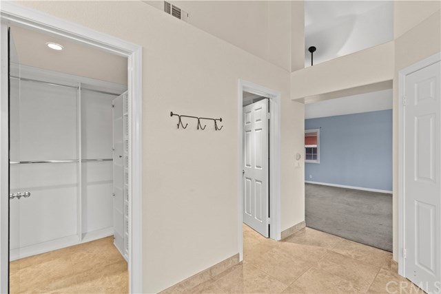 16 Flores Lake Forest, CA 92610 - Photo 18 of 24 Dual walk in closets, complete with closet organizers. Picture perfect.