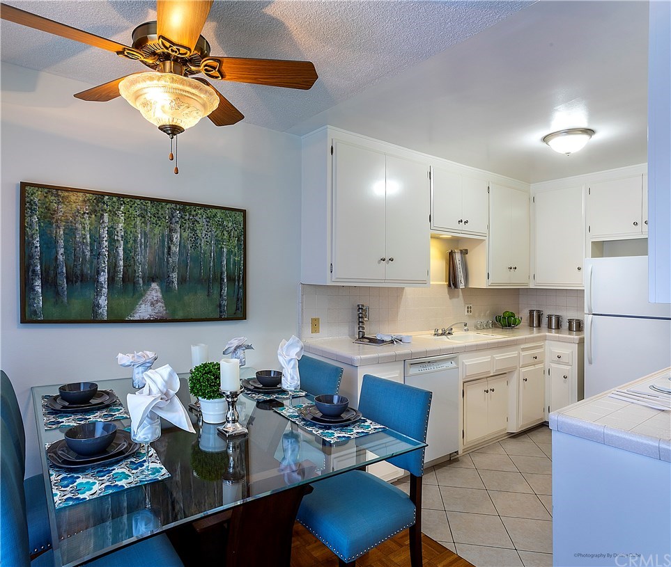 333 Junipero Avenue, Unit 1K Long Beach, CA 90814 - Photo 5 of 13 Dining area opens to the outside and the kitchen.