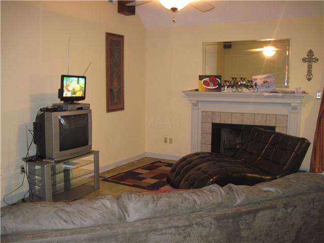 256 South Walnut Bend Road Memphis, TN 38018 - Photo 5 of 12 An absolutely gorgeous marble and carved wood mantel fireplace in this spacious family room.