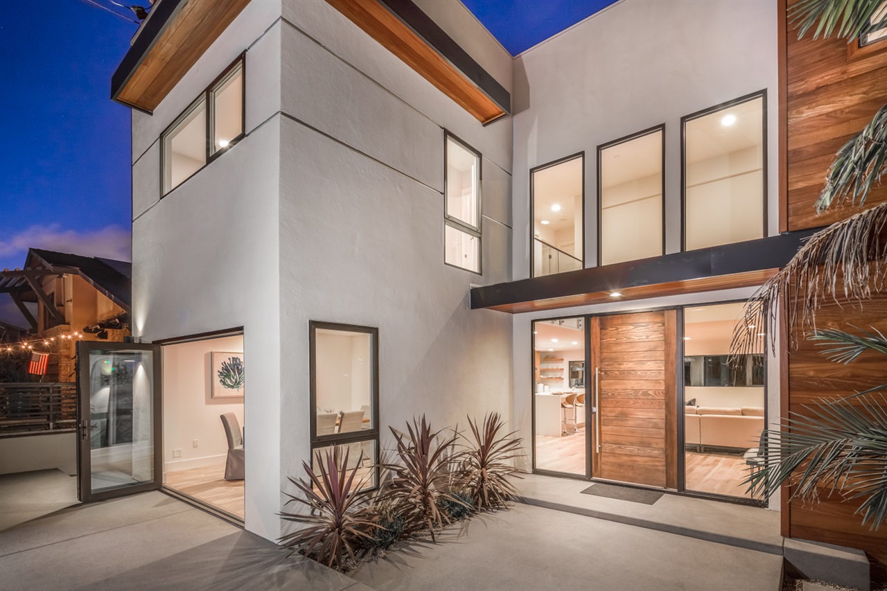 244 Pacific Avenue Solana Beach, CA 92075 - Photo 2 of 20 Front entry with custom pivot door and outdoor shower for times at the beach