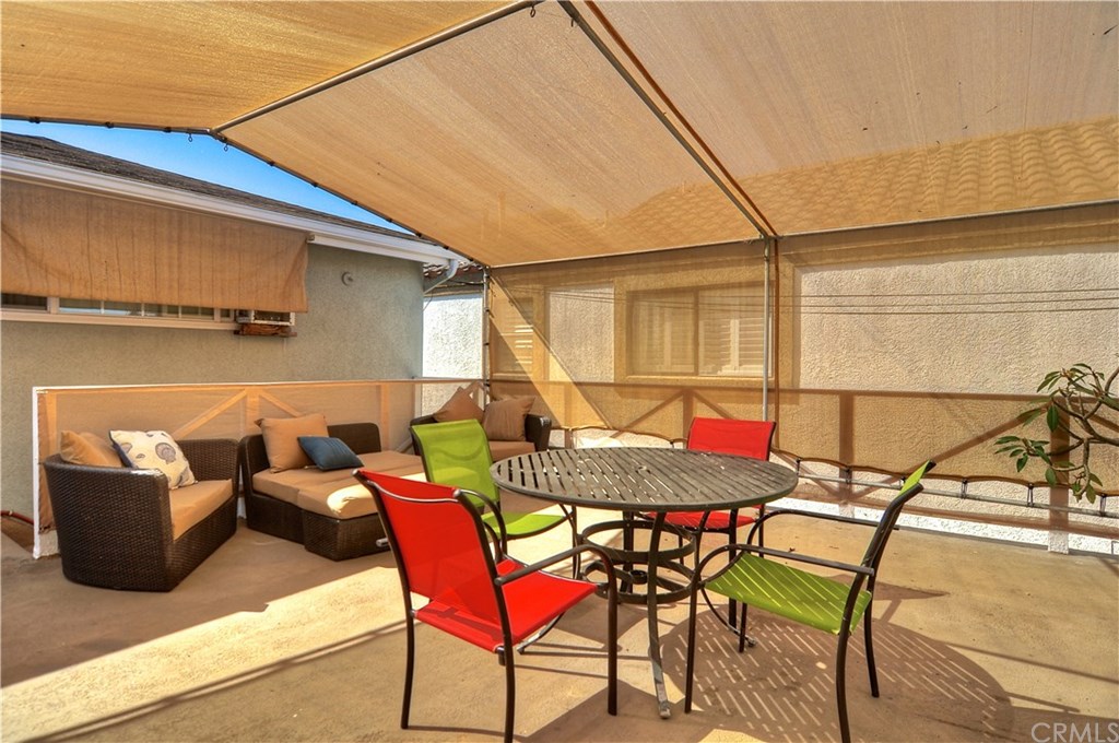 253 17th Street Seal Beach, CA 90740 - Photo 29 of 36 Another angle of this private, spacious, entertaining, covered deck
