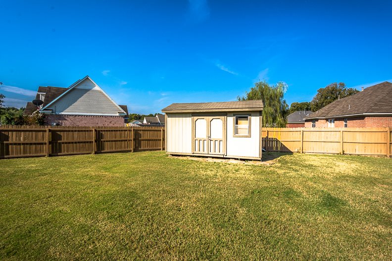 2555 Tracy Road Atoka, TN 38004 - Photo 18 of 21 In Large, Fenced Back Yard and Great For Storing Yard Tools, Pool Things, Etc.