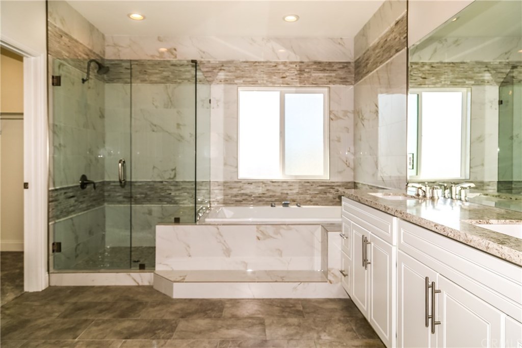 14221 Hammon Place Westminster, CA 92683 - Photo 7 of 52 Master Bathroom with Soaking Tub, Double Vanity and Walk-in Closet.