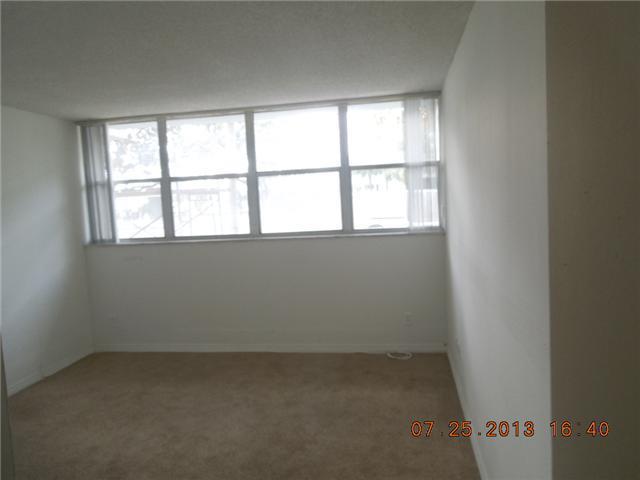 700 Northwest 214th Street, Unit 101 Miami, FL 33169 - Photo 10 of 12