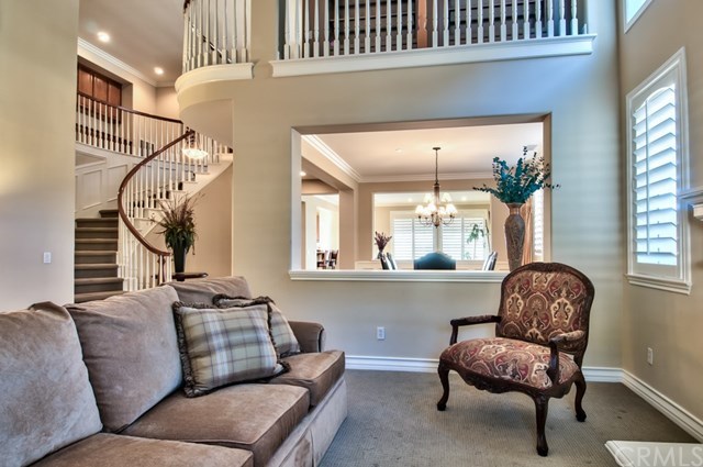 2148 Sageleaf Circle Corona, CA 92882 - Photo 74 of 74 Experience the luxury of tall ceilings, crown moldings and wood plantation shutters along with an open staircase and a truly exceptional floor plan that boasts 5 bedrooms, including one downstairs, a game room, a library, 4 baths and 3 viewing balconies.