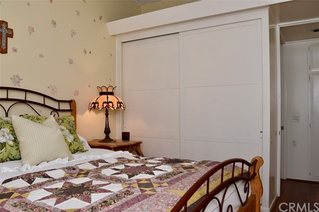 13881 Thunderbird Drive, Unit 64K Seal Beach, CA 90740 - Photo 15 of 21 Large closet in bedroom with view of entrance to bathroom.