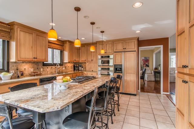 1108 Natchez Road Franklin, TN 37069 - Photo 6 of 25 Note the back wall with custom pantry. Additionally, the refrigerator has cabinetry doors, double SS ovens, pendant lighting over island, marble backsplash. Did I mention the view? I did mention privacy? Right?