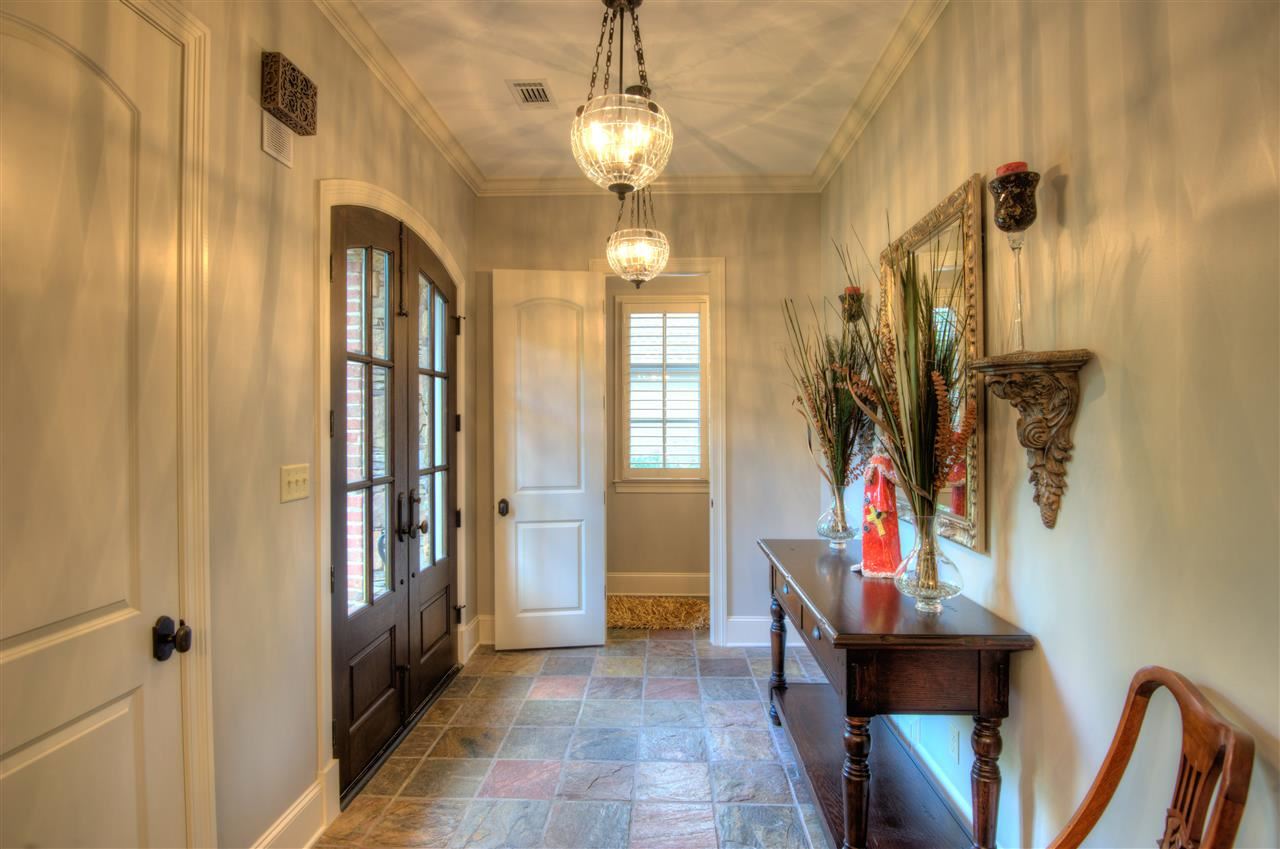 1277 South Dubray Place Collierville, TN 38017 - Photo 2 of 25 The gracious and inviting foyer beckons you into this magnificent residence. Gorgeous slate floor and ten foot smooth ceiling make a statement.