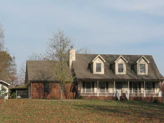 50 Stephen Hill Road Atoka, TN 38004 - Photo 1 of 11 Lovely home with country porch situated on large corner lot in upscale Atoka neighborhood.