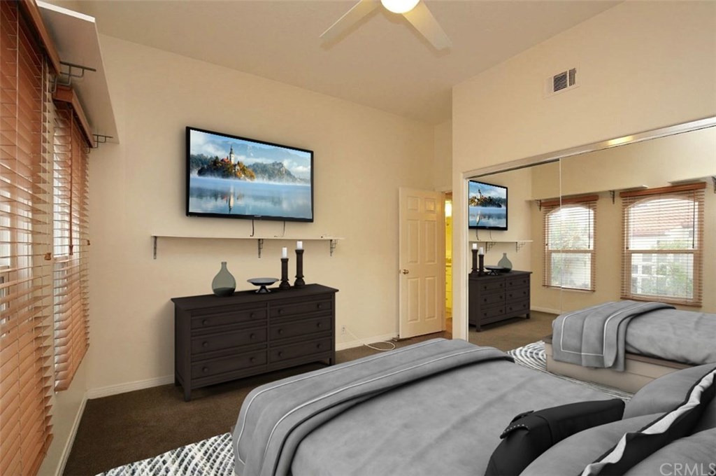 16 Flores Lake Forest, CA 92610 - Photo 22 of 24 This huge upstairs bedroom has beautiful mirror wardrobes.