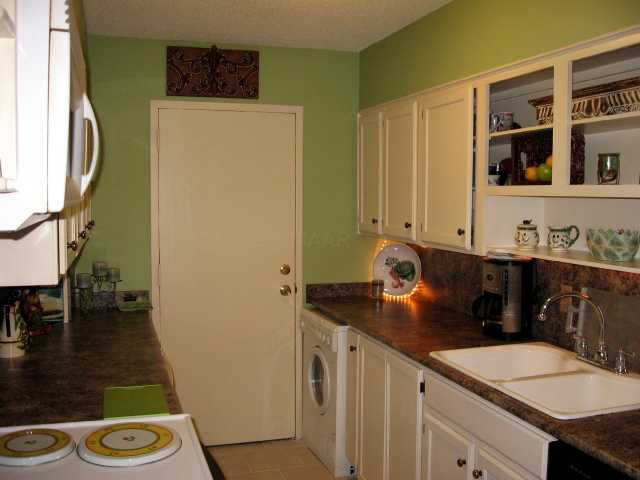 3080 Walnut Grove Road, Unit 201 Memphis, TN 38111 - Photo 5 of 6 Updated kitchen with custom cabinets and new countertops,ceramic tile floor, all appliances including separate under-the-counter freezer,combo washer dryer and more