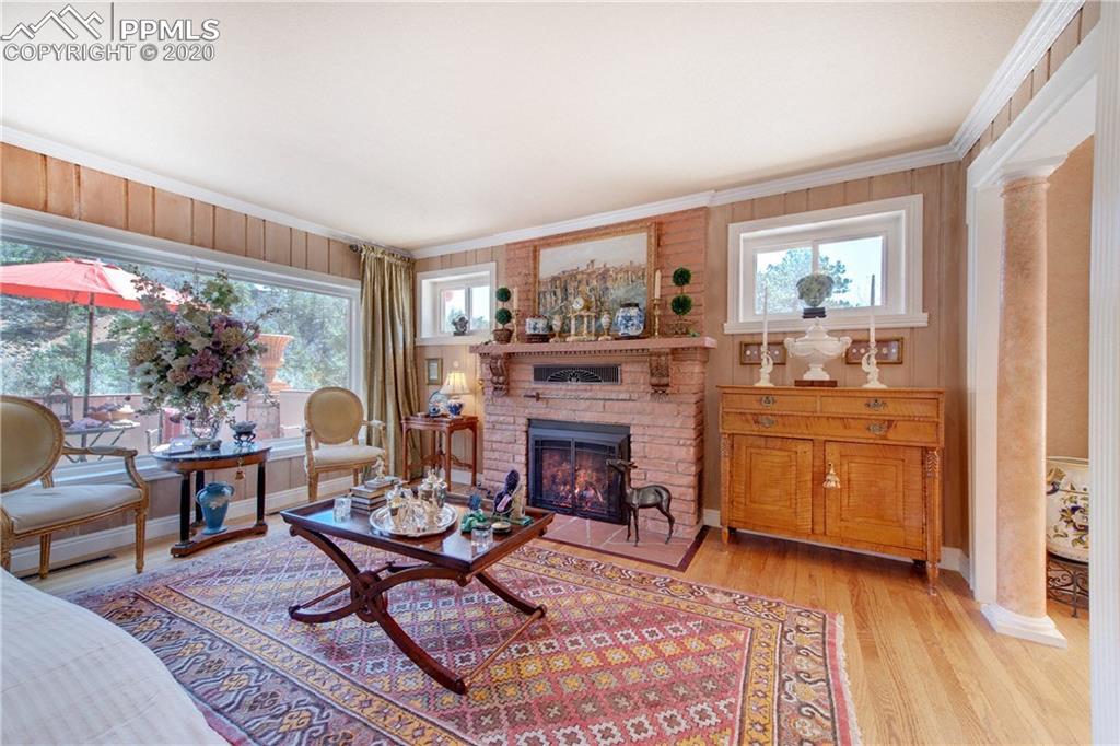 7955 Highway 24 Cascade, CO 80809 - Photo 8 of 36 Large windows let the light shine in year-round.